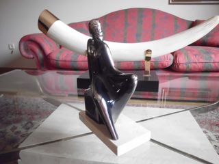 Escultura porta celi a mano certificada