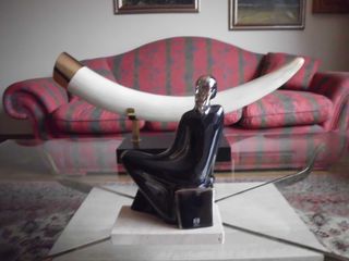 Escultura porta celi a mano certificada