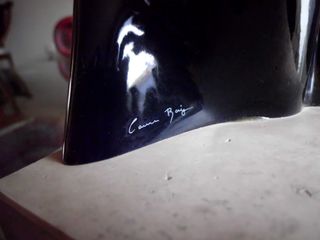 Escultura porta celi a mano certificada