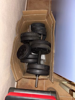 Banco de musculacion con pesas de arena