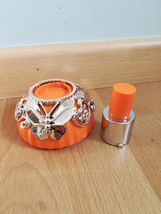 Muñeca Perfumitos naranja