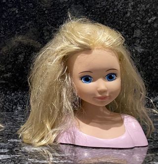 Busto muñeca