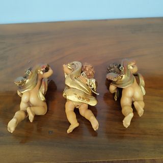 Tris di angeli in legno artigianali