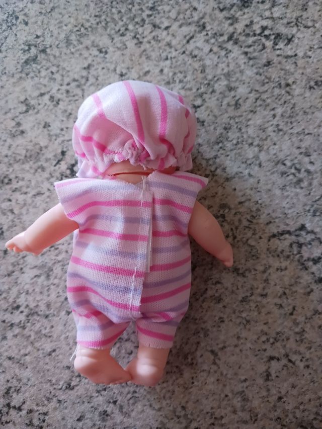 Bambolina movibile in vinile con orsetto