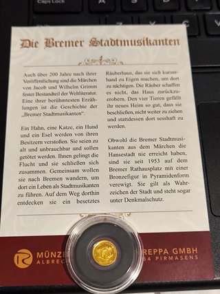Moneda oro .999 los trotamusicos