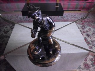 Escultura metalica de artesano zapatero