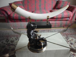 Escultura metalica de artesano zapatero