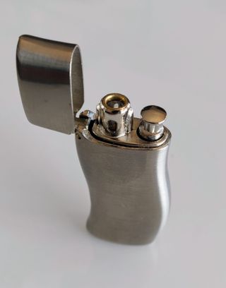 Encendedor picoflam con boligrafo. Publicidad.