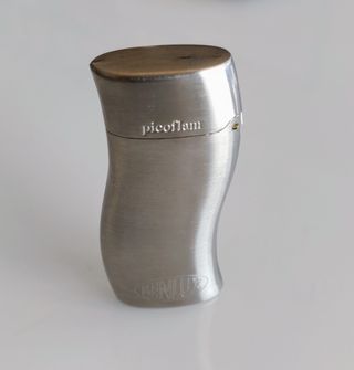 Encendedor picoflam con boligrafo. Publicidad.