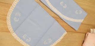 Sábana de moisés con encaje de bolillos