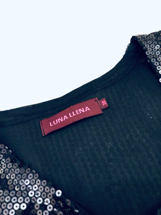 Chaqueta lentejuelas con lazada ideal para Navidad