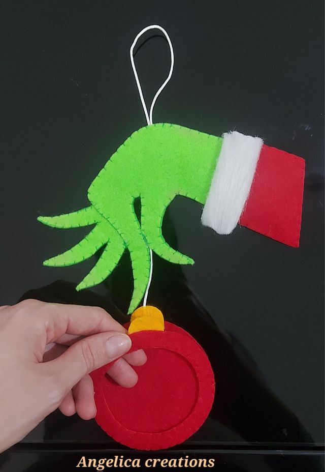 Mano del Grinch cornice portafoto