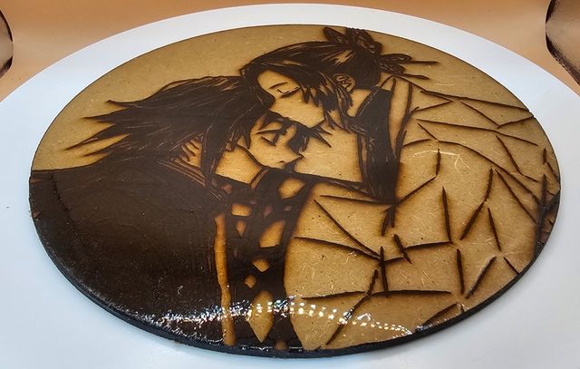 Grabado Láser- Tomioka y Shinobu, cubierto resina