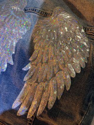 Chaqueta tejana con alas