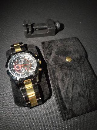 Reloj acero inox nwgro/dorado hombre