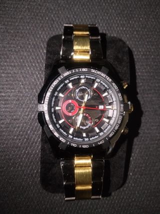 Reloj acero inox nwgro/dorado hombre