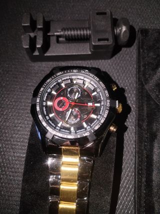 Reloj acero inox nwgro/dorado hombre