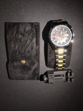 Reloj acero inox nwgro/dorado hombre