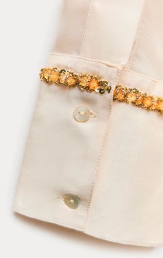 Blusa combinada lentejuelas