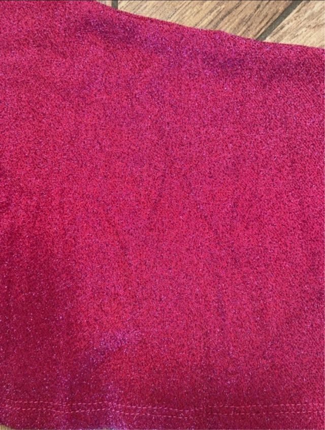 Top monospalla fuxia