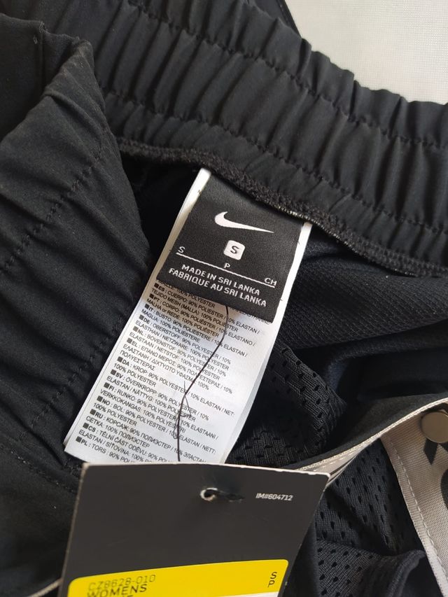 Pantalon Nike corchetes mujer