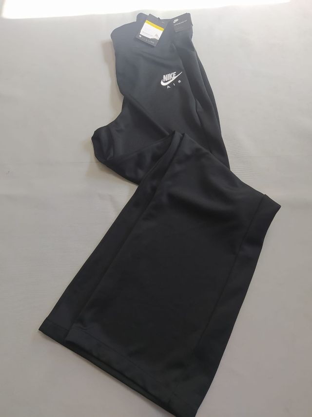 Pantalon Nike corchetes mujer