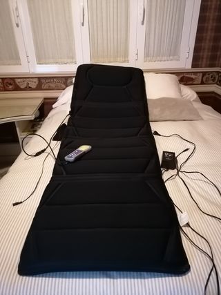 Colchoneta de masajes y calor