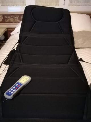 Colchoneta de masajes y calor