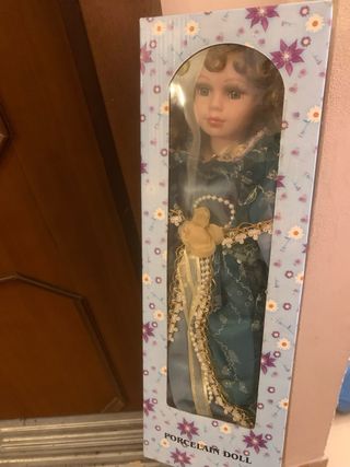 Bambola in porcellana