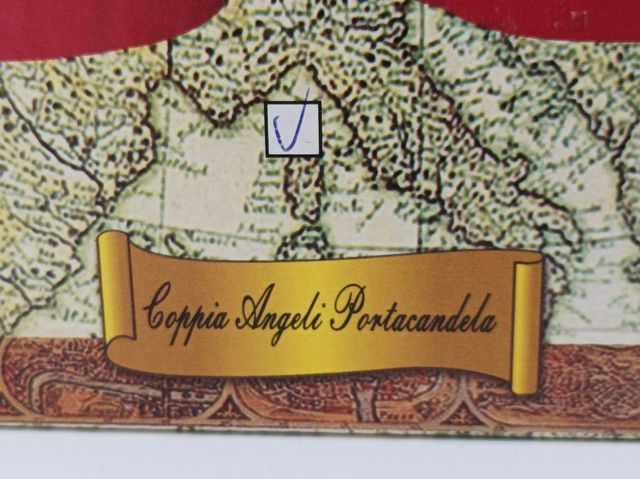 coppia di angeli in ceramica