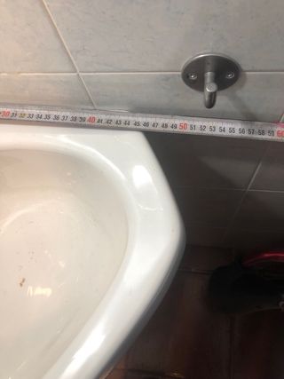 Lavabo Roca triangular con grifo