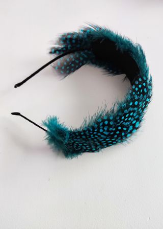 Diadema, tocado de plumas azul turquesa