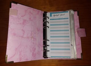 Caderno A6 de orçamentos (budget binder)