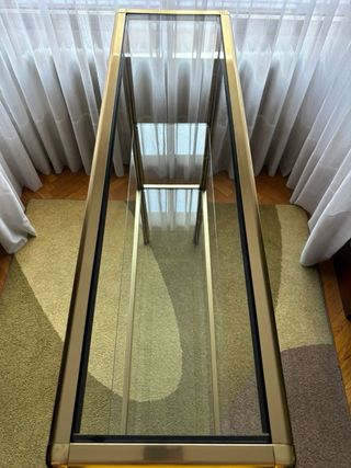 Mobili libreria in oro e vetro