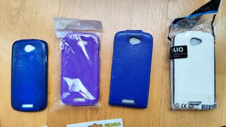 Teléfono HTC ONE S + 5 fundas + cargador coche