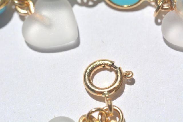 Bracciale oro 18kt turchesi e cristalli