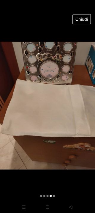 Cornice bimbo in argento 