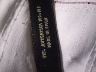 Cinturón piel Tous plata 35€