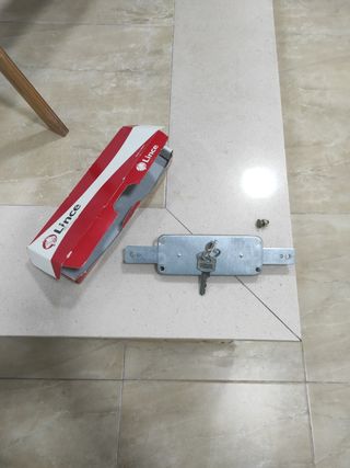 Cerradura persiana garaje