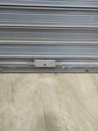 Cerradura persiana garaje