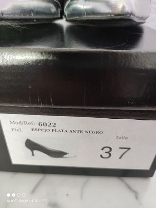 Zapatos de fiesta, ante y piel negros