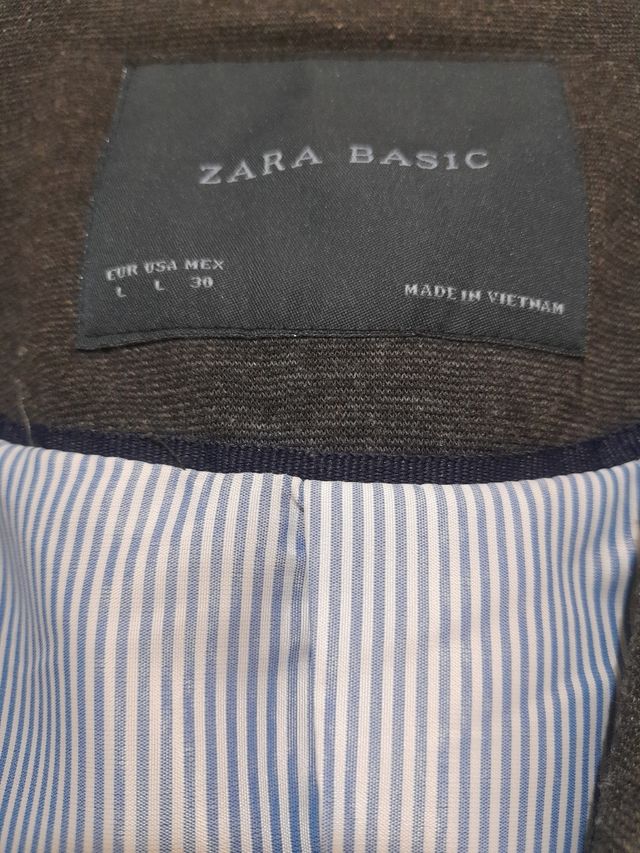 Blazer gris elásticaca talla 40.Entallada.