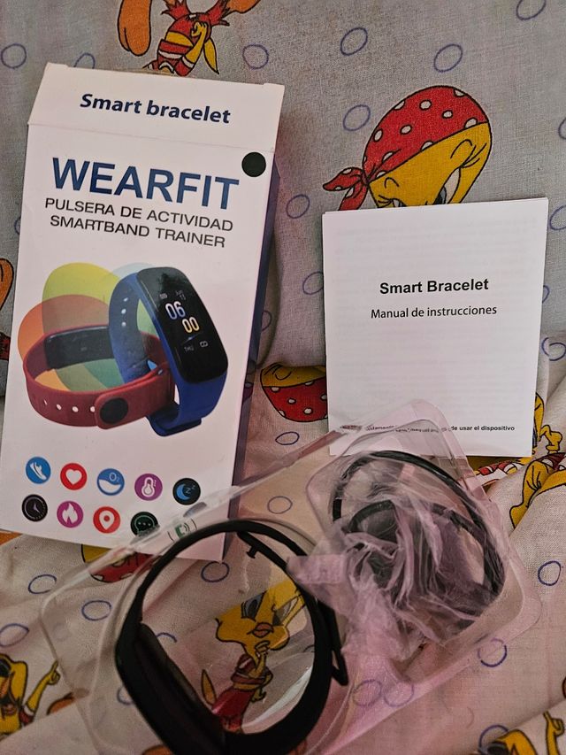 Reloj inteligente + cascos