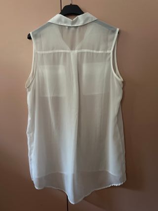 Camicetta lunga bianca sbracciata