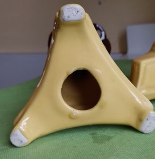 Coppia porta candele in ceramica.