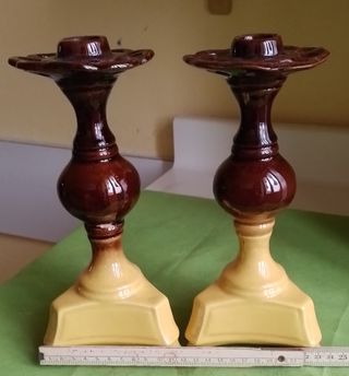 Coppia porta candele in ceramica.