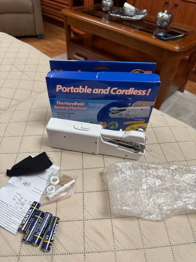 Makina de coser de mano