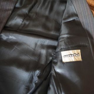 Traje de caballero mil rayas.