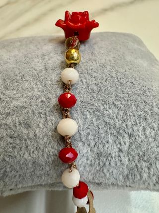 Bracciale con cristalli rossi e rosa rossa