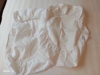 Dos bajeras blancas para Moisés